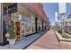Upscale retail store exterior with large glass windows, showcasing designer brands and boutique shopping experience at 421 Saint Paul St, Denver, CO 80206