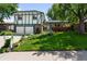 Charming two-story home with well-maintained lawn, lush landscaping, and a two-car garage at 10520 W 101St Pl, Westminster, CO 80021