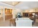 Cozy living room with fireplace, built-in bar, and comfortable seating at 10520 W 101St Pl, Westminster, CO 80021