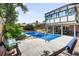 Backyard showcases a pool, patio area with chairs, and garden area at 10520 W 101St Pl, Westminster, CO 80021