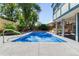 Backyard view of rectangular pool area with spacious patio area at 10520 W 101St Pl, Westminster, CO 80021