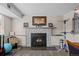 Basement fireplace with decorative stone surround, and space for decorative objects at 11323 Albion St, Thornton, CO 80233