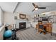 Basement living area featuring an office space, fireplace, and workout equipment at 11323 Albion St, Thornton, CO 80233