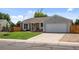Lovely single-Gathering home boasting a well-maintained lawn and an attached two-car garage at 11323 Albion St, Thornton, CO 80233