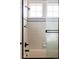 Bright bathroom features a shower-tub with black fixtures and elegant tiled walls at 10260 Longview Dr, Lone Tree, CO 80124
