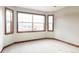 The bedroom features large windows that allow for natural light to enter the room at 10260 Longview Dr, Lone Tree, CO 80124