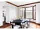 Elegant dining room featuring an oval table, stylish chairs, and natural light at 10260 Longview Dr, Lone Tree, CO 80124
