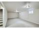 Spacious basement with carpet flooring and natural light at 3107 S Wolff St, Denver, CO 80236