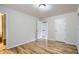 This bedroom has gleaming hardwood floors and a neutral color palette at 3107 S Wolff St, Denver, CO 80236