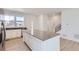 A gourmet kitchen featuring quartz countertops, a large island, and modern appliances at 712 N Bently St, Watkins, CO 80137
