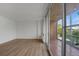 Bright living room with hardwood floors, patio access, and modern finishes at 3100 E Cherry Creek S Dr # 307, Denver, CO 80209
