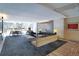 Spacious lounge area with modern furnishings, decorative walls, and lots of natural light from the outside at 3100 E Cherry Creek S Dr # 307, Denver, CO 80209