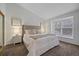 Serene bedroom featuring a comfortable bed, soft lighting, and a peaceful ambiance at 1080 E 130Th Ave # A, Thornton, CO 80241