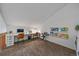 Spacious bonus room featuring a desk, piano and bookshelves, creating a versatile workspace at 1080 E 130Th Ave # A, Thornton, CO 80241