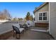 This private patio area has an enclosed fence with contemporary outdoor furniture at 1080 E 130Th Ave # A, Thornton, CO 80241