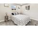 Serene bedroom with neutral decor, a comfortable bed, and natural light from the windows at 3210 Newport St, Denver, CO 80207