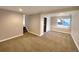 Spacious basement area with a small window and stairway at 4901 Yates Ct, Broomfield, CO 80020