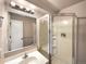 Standard bathroom with shower, vanity, medicine cabinet and neutral color scheme at 4901 Yates Ct, Broomfield, CO 80020