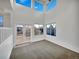Bright living room with high ceilings and large windows offering lots of natural light at 4901 Yates Ct, Broomfield, CO 80020