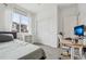 Well-lit bedroom offering ample space, natural light, and modern furnishings at 17039 E Exposition Dr, Aurora, CO 80017