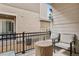 Outdoor patio area with comfortable seating and a gas fire pit at 17039 E Exposition Dr, Aurora, CO 80017
