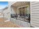 Inviting outdoor patio with a seating area and easy access to the house at 17039 E Exposition Dr, Aurora, CO 80017