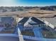 Stunning aerial view of a single Gathering home with manicured lawn and inviting curb appeal at 12668 Ulster St, Thornton, CO 80602