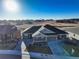 Beautiful home with a well-manicured front yard and an attached two-car garage, as seen from an aerial view at 12668 Ulster St, Thornton, CO 80602