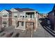 Beautiful two-story townhome featuring private balconies, providing an excellent view of the well-maintained grounds at 12668 Ulster St, Thornton, CO 80602