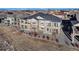 Striking two-story townhome featuring private balconies perfect for enjoying the outdoors and scenic views at 12668 Ulster St, Thornton, CO 80602