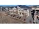 Two-story townhome with private balconies offering scenic views, complemented by well-maintained landscaping at 12668 Ulster St, Thornton, CO 80602
