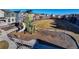 Community playground featuring modern play equipment and green space at 12668 Ulster St, Thornton, CO 80602