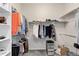 Organized walk-in closet providing ample storage space for clothing and accessories at 12668 Ulster St, Thornton, CO 80602