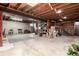 Large basement area with visible beams, concrete floor, and available storage space at 3720 S Willow Cir, Denver, CO 80237