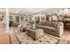 Inviting living space featuring hardwood floors and natural light at 3720 S Willow Cir, Denver, CO 80237