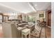 Comfortable living room with hardwood floors and backyard views at 3720 S Willow Cir, Denver, CO 80237