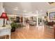 Spacious living room with hardwood floors and an open layout at 3720 S Willow Cir, Denver, CO 80237