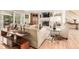 Cozy living area with a fireplace and hardwood floors at 3720 S Willow Cir, Denver, CO 80237