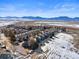 Lovely townhomes with mountain views in a snow-covered landscape on a sunny day at 281 Rockview Dr, Superior, CO 80027