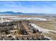 Lovely townhomes with scenic mountain views in a snow-covered landscape on a sunny day at 281 Rockview Dr, Superior, CO 80027
