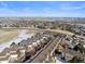 Exterior shot of beautiful townhomes with attached garages and balconies in a scenic landscape on a sunny day at 281 Rockview Dr, Superior, CO 80027
