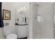 Cozy bathroom featuring white vanity and walk-in shower with bright lighting at 281 Rockview Dr, Superior, CO 80027