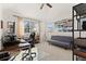 Well-lit bedroom with neutral carpet, ceiling fan, modern desk and comfortable futon at 281 Rockview Dr, Superior, CO 80027