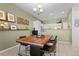 Inviting dining room with a modern table, stylish chairs, and easy access to the kitchen at 281 Rockview Dr, Superior, CO 80027