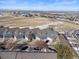 Charming townhomes with attached garages and beautiful mountain views on a partly cloudy day at 281 Rockview Dr, Superior, CO 80027
