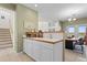 Bright kitchen with white cabinetry and wood countertops at 281 Rockview Dr, Superior, CO 80027