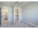 Comfortable bedroom leading to an en-suite bathroom and walk in closet at 1732 Stable View Dr, Castle Pines, CO 80108
