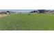 A sprawling green community park offers ample space for recreation and relaxation for residents at 1732 Stable View Dr, Castle Pines, CO 80108