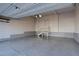 Spacious garage with epoxy flooring and ample storage space at 1732 Stable View Dr, Castle Pines, CO 80108
