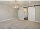 Comfortable main bedroom featuring neutral colors and an en-suite bathroom at 1732 Stable View Dr, Castle Pines, CO 80108